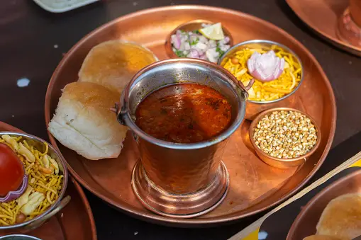 Flavors of Maharashtra: Misal Pav – A Spicy and Tasty Street Food Delight